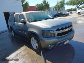 2007 Chevrolet Suburban LTZ with VIN 3GNFC16087G242868, listed as a IAAI auction lot 41872386 with 203,525 mi miles. Bid and sale history available at carsss.com. Image 1.