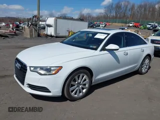 2015 Audi A6 2.0T Premium Plus with VIN WAUGFAFC7FN025958, listed as a IAAI auction lot 41888489 with 100,600 mi miles. Bid and sale history available at carsss.com. Image 17.