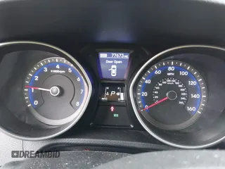 2013 Hyundai Elantra GT with VIN KMHD35LE0DU148382, listed as a IAAI auction lot 41898768 with 77,673 mi miles. Bid and sale history available at carsss.com. Image 7.