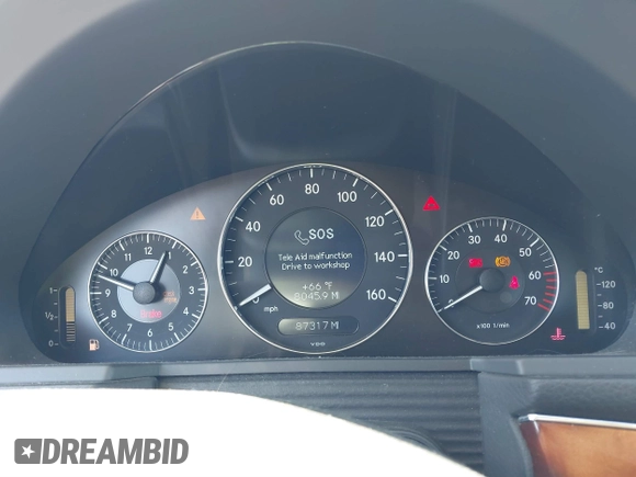 2005 Mercedes-Benz E-Class 3.2L with VIN WDBUF65J15A669561, listed as a IAAI auction lot 41888887 with 87,317 mi miles. Bid and sale history available at carsss.com. Image 7.