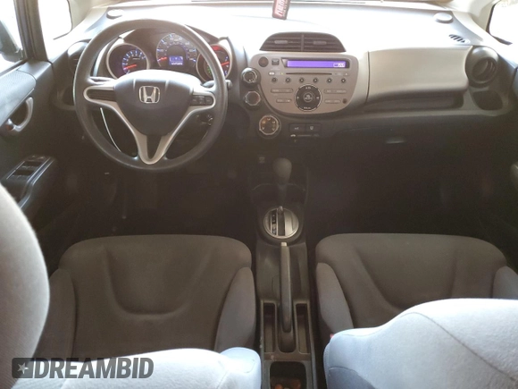 2012 Honda Fit с VIN JHMGE8H3XCC024885, выставлен на аукционе Copart как лот 61487195 с пробегом 122 589 миль миль и Списание • Salvage title. История ставок и продаж доступна на DreamBid. Изображение 8.