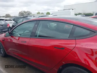 2025 Tesla Model 3 Long Range with VIN 5YJ3E1EB9SF928781, listed as a IAAI auction lot 41870681 with 261 mi miles and . Bid and sale history available at DreamBid. Image 15.