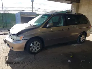 2004 Honda Odyssey EX-RES z VIN 5FNRL18874B127785, wystawiony jako IAAI lot #41141221 z przebiegiem 151 036 mil mil oraz . Historia ofert i sprzedaży dostępna na DreamBid. Obrazek 17.