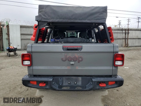 2021 Jeep Gladiator Rubicon with VIN 1C6JJTBG5ML615653, listed as a Copart auction lot 51297795 with 48,918 mi miles and Salvage title. Bid and sale history available at DreamBid. Image 6.