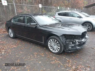 2020 BMW 7 Series 740i xDrive with VIN WBA7T4C03LGF97312, listed as a IAAI auction lot 40970033 with 60,231 mi miles and . Bid and sale history available at DreamBid. Image 1.