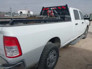 2022 Ram 2500 Tradesman with VIN 3C6UR5HL5NG155348, listed as a IAAI auction lot 41558324 with 118,500 mi miles. Bid and sale history available at carsss.com. Image 4.