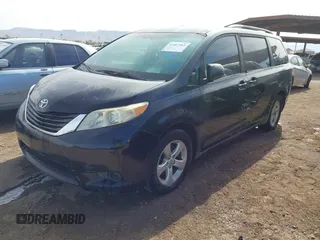 2012 Toyota Sienna LE AAS with VIN 5TDKK3DC7CS255500, listed as a IAAI auction lot 41467563 with 146,306 mi miles. Bid and sale history available at carsss.com. Image 2.