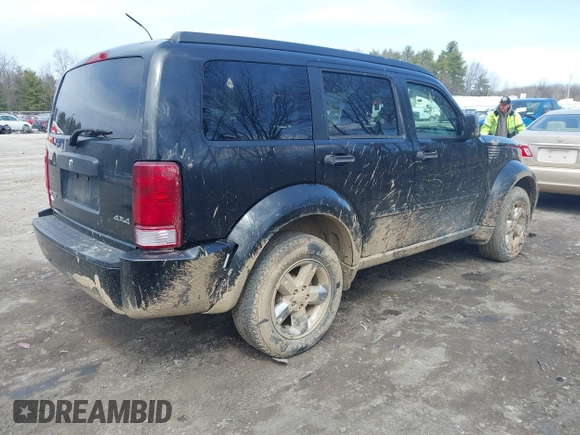 2008 Dodge Nitro SXT with VIN 1D8GU28K98W225158, listed as a IAAI auction lot 41911789 with 180,450 mi miles. Bid and sale history available at carsss.com. Image 4.