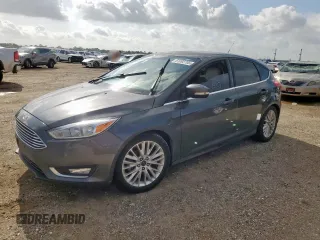 2016 Ford Focus Titanium with VIN 1FADP3N23GL407379, listed as a Copart auction lot 61092705 with 72,573 mi miles and Salvage title. Bid and sale history available at DreamBid. Image 1.