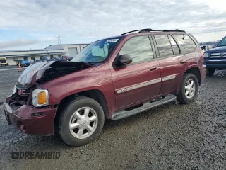 2003 GMC Envoy SLT with VIN 1GKDT13S032245485, listed as a Copart auction lot 84385304 with 139,183 mi miles and Salvage Title. Bid and sale history available at carsss.com. Image 1.