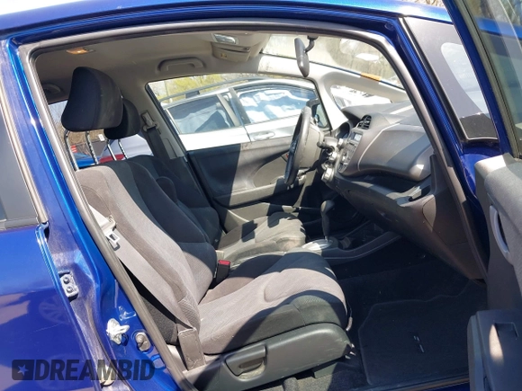 2010 Honda Fit Sport with VIN JHMGE8H4XAS018807, listed as a IAAI auction lot 41990369 with 63,151 mi miles. Bid and sale history available at carsss.com. Image 5.