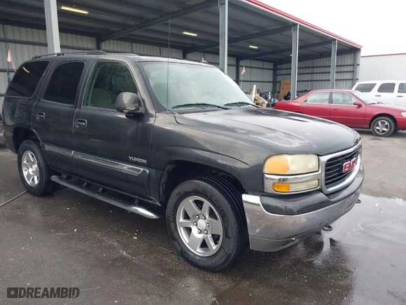 2005 GMC Yukon SLT with VIN 1GKEC13T75R144645, listed as a IAAI auction lot 41703999 with 222,585 mi miles. Bid and sale history available at carsss.com. Image 1.