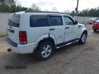 2008 Dodge Nitro SXT with VIN 1D8GU28K18W129119, listed as a IAAI auction lot 41899314 with 244,830 mi miles. Bid and sale history available at carsss.com. Image 4.