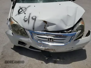 2010 Honda Odyssey LX with VIN 5FNRL3H23AB032112, listed as a Copart auction lot 60876035 with 223,335 mi miles and Salvage title. Bid and sale history available at DreamBid. Image 12.