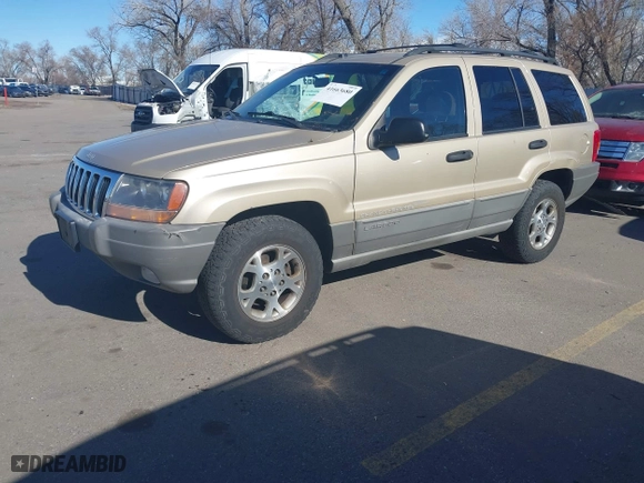 1999 Jeep Grand Cherokee Laredo with VIN 1J4GW58S4XC787702, listed as a IAAI auction lot 41663680 with 177,256 mi miles. Bid and sale history available at carsss.com. Image 2.