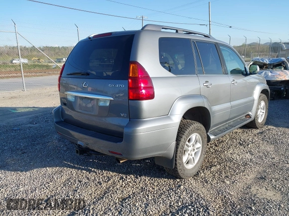 2004 Lexus GX 470 with VIN JTJBT20X440045714, listed as a IAAI auction lot 42026723 with 237,762 mi miles. Bid and sale history available at carsss.com. Image 4.