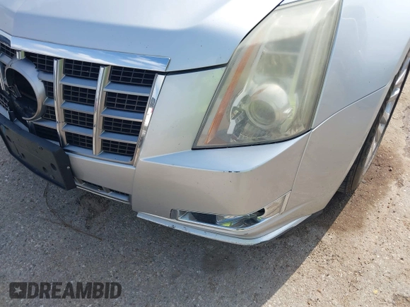 2012 Cadillac CTS Performance z VIN 1G6DJ5E37C0145221, wystawiony jako IAAI lot #42111935 z przebiegiem 82 103 mil mil oraz . Historia ofert i sprzedaży dostępna na DreamBid. Obrazek 13.