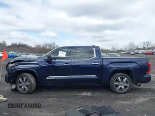2022 Toyota Tundra Capstone Hybrid with VIN 5TFVC5DB5NX009829, listed as a IAAI auction lot 41983391 with 70,015 mi miles and . Bid and sale history available at DreamBid. Image 14.