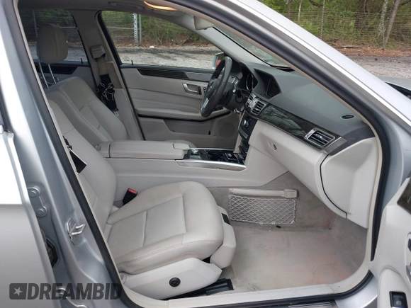 2014 Mercedes-Benz E 350 Sport with VIN WDDHF5KB2EA812825, listed as a IAAI auction lot 41976973 with 121,000 mi miles and . Bid and sale history available at DreamBid. Image 5.