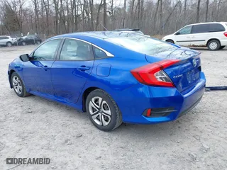 2016 Honda Civic Sedan LX with VIN 19XFC2F51GE233385, listed as a IAAI auction lot 42043765 with 112,253 mi miles. Bid and sale history available at carsss.com. Image 3.