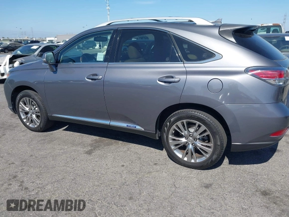 2013 Lexus RX 450h with VIN JTJBC1BAXD2053422, listed as a IAAI auction lot 42304531 with 117,035 mi miles and . Bid and sale history available at DreamBid. Image 14.