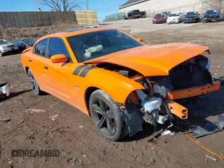 2014 Dodge Charger SXT with VIN 2C3CDXHG3EH305320, listed as a IAAI auction lot 41656935 with 149,041 mi miles and . Bid and sale history available at DreamBid. Image 1.