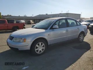 2001 Volkswagen Passat z VIN WVWAC63B41P013693, wystawiony jako Copart lot #74254064 z przebiegiem 106 707 mil mil oraz Szkoda całkowita • Salvage title. Historia ofert i sprzedaży dostępna na DreamBid. Obrazek 1.