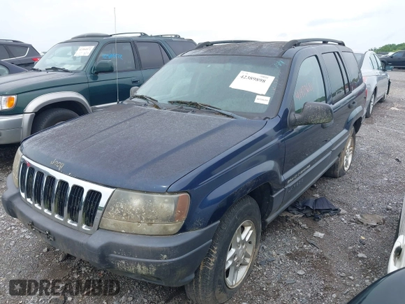2003 Jeep Grand Cherokee Laredo with VIN 1J4GW48S63C591605, listed as a IAAI auction lot 42389898 with 177,024 mi miles and . Bid and sale history available at DreamBid. Image 2.