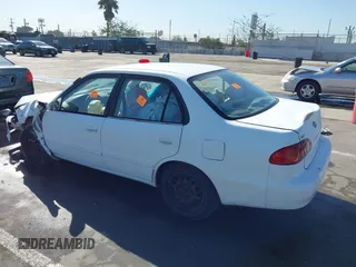 2002 Toyota Corolla CE with VIN 2T1BR12EX2C523872, listed as a IAAI auction lot 41831610 with Not provided miles and . Bid and sale history available at DreamBid. Image 3.