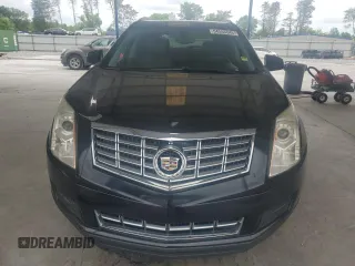 2014 Cadillac SRX z VIN 3GYFNAE39ES558430, wystawiony jako Copart lot #54555645 z przebiegiem 119 524 mil mil oraz Szkoda całkowita • Salvage title. Historia ofert i sprzedaży dostępna na DreamBid. Obrazek 5.