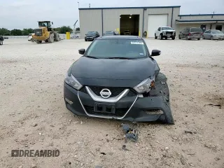 2016 Nissan Maxima SL with VIN 1N4AA6AP7GC384776, listed as a Copart auction lot 54777145 with 107,140 mi miles and Salvage title. Bid and sale history available at DreamBid. Image 13.