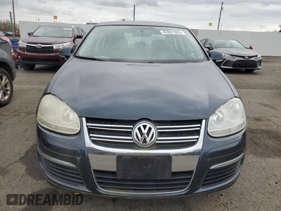 2010 Volkswagen Jetta S z VIN 3VWJX7AJ7AM027269, wystawiony jako Copart lot #60443375 z przebiegiem Nie podano mil oraz Szkoda całkowita • Salvage title. Historia ofert i sprzedaży dostępna na DreamBid. Obrazek 5.