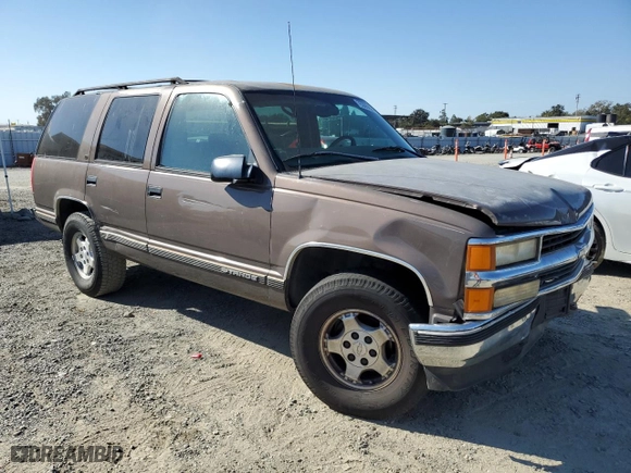 1998 Chevrolet Tahoe with VIN 1GNEK13R5WJ371083, listed as a Copart auction lot 76305624 with 186,100 mi miles and Clean Title. Bid and sale history available at carsss.com. Image 4.