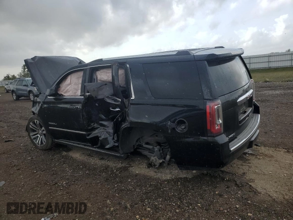 2020 GMC Yukon Denali with VIN 1GKS1CKJ9LR222733, listed as a Copart auction lot 78267704 with 51,971 mi miles and Salvage Title. Bid and sale history available at carsss.com. Image 2.