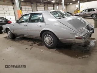 1980 Cadillac Seville z VIN 6S69NAE688845, wystawiony jako Copart lot #78749194 z przebiegiem 66 974 mil mil oraz Tytuł czysty. Historia ofert i sprzedaży dostępna na DreamBid. Obrazek 2.