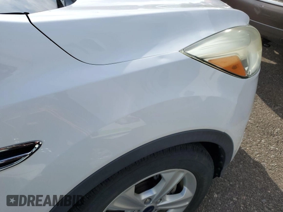 2013 Ford Escape SE z VIN 1FMCU9G93DUD04038, wystawiony jako IAAI lot #42587629 z przebiegiem 213 211 mil mil oraz . Historia ofert i sprzedaży dostępna na DreamBid. Obrazek 29.
