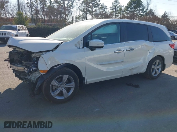 2018 Honda Odyssey EX-L z VIN 5FNRL6H79JB014419, wystawiony jako IAAI lot #41654269 z przebiegiem 84 372 mil mil oraz . Historia ofert i sprzedaży dostępna na DreamBid. Obrazek 17.