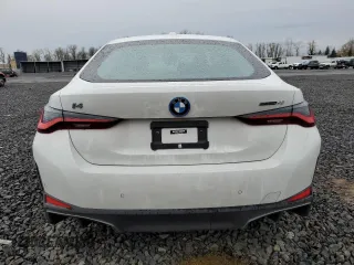 2023 BMW i4 eDrive40 with VIN WBY73AW01PFP77943, listed as a Copart auction lot 39385944 with 8,390 mi miles. Bid and sale history available at carsss.com. Image 6.