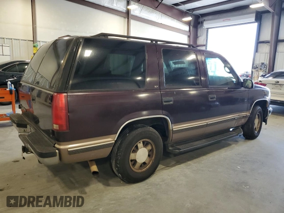 1997 GMC Yukon with VIN 1GKEC13R2VJ734299, listed as a Copart auction lot 74988224 with 225,335 mi miles and Salvage Title. Bid and sale history available at carsss.com. Image 3.