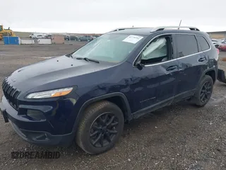 2016 Jeep Cherokee Latitude with VIN 1C4PJMCS1GW255876, listed as a IAAI auction lot 41775711 with 117,519 mi miles. Bid and sale history available at carsss.com. Image 2.