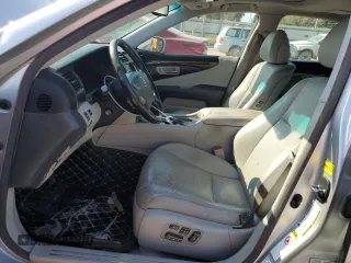2009 Lexus LS 460 with VIN JTHCL46F795001457, listed as a Copart auction lot 69957804 with 143,649 mi miles and Salvage Title. Bid and sale history available at DreamBid. Image 7.