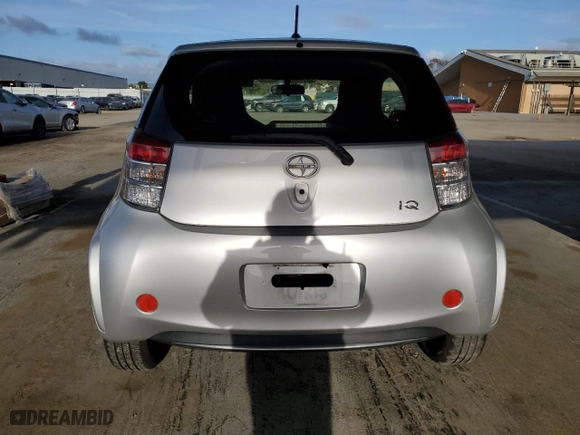 2015 Scion iQ with VIN JTNJJXB01FJ030680, listed as a Copart auction lot 46949235 with 27,509 mi miles and Salvage Title. Bid and sale history available at carsss.com. Image 6.