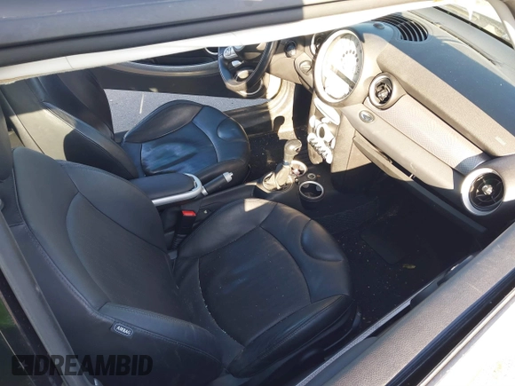2007 MINI Hardtop S with VIN WMWMF73567TL91385, listed as a IAAI auction lot 41866865 with 114,778 mi miles and . Bid and sale history available at DreamBid. Image 5.