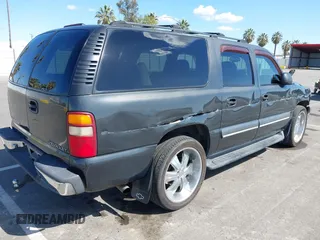 2003 Chevrolet Suburban LS with VIN 3GNEC16T63G115908, listed as a IAAI auction lot 41950165 with 202,075 mi miles. Bid and sale history available at carsss.com. Image 4.