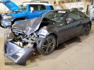 2014 Scion FR-S z VIN JF1ZNAA11E9701435, wystawiony jako Copart lot #72603834 z przebiegiem 127 940 mil mil oraz Szkoda całkowita • Salvage title. Historia ofert i sprzedaży dostępna na DreamBid. Obrazek 1.