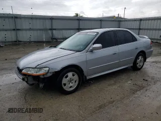 2001 Honda Accord EX z VIN 1HGCG165X1A076095, wystawiony jako Copart lot #58545445 z przebiegiem 200 513 mil mil oraz Szkoda całkowita • Salvage title. Historia ofert i sprzedaży dostępna na DreamBid. Obrazek 1.