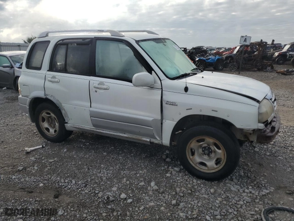 2005 Suzuki Grand Vitara LX with VIN JS3TD62V654201612, listed as a Copart auction lot 73722314 with 0 mi miles and Salvage Title. Bid and sale history available at carsss.com. Image 4.
