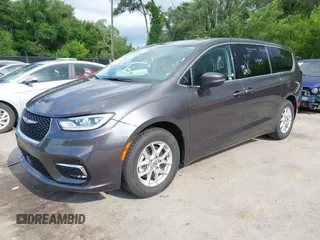 2023 Chrysler Pacifica Touring L with VIN 2C4RC1BG6PR612749, listed as a IAAI auction lot 42612932 with 69,931 mi miles and . Bid and sale history available at DreamBid. Image 18.