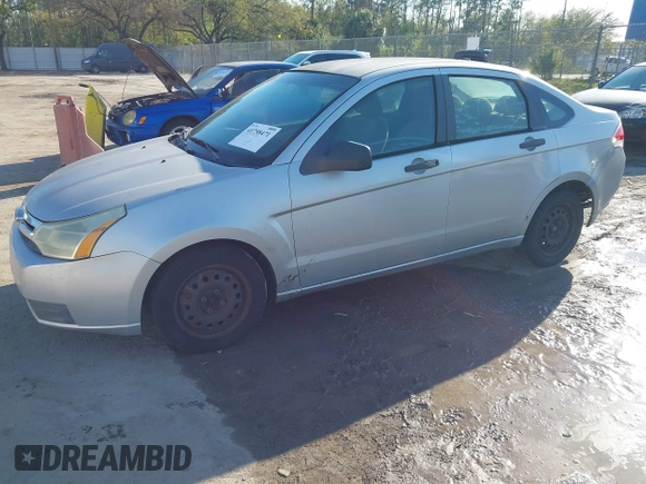 2009 Ford Focus S with VIN 1FAHP34N79W221813, listed as a IAAI auction lot 41758471 with 248,531 mi miles. Bid and sale history available at carsss.com. Image 2.