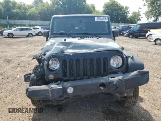 2015 Jeep Wrangler Willys Wheeler z VIN 1C4AJWAG2FL647913, wystawiony jako Copart lot #63986705 z przebiegiem 111 426 mil mil oraz Czysty tytuł • Clean title. Historia ofert i sprzedaży dostępna na DreamBid. Obrazek 5.